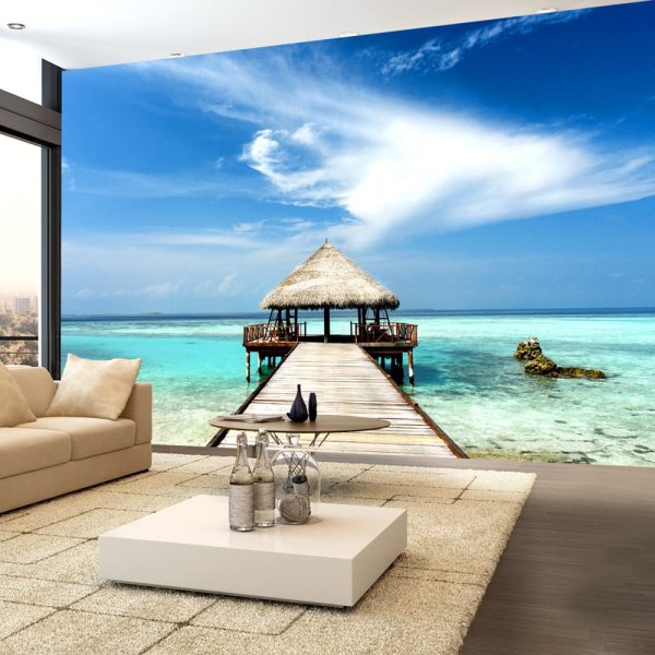 ARTGEIST - Fototapet med utsikt över stuga vid vattnet i paradiset - Flera storlekar 300x210